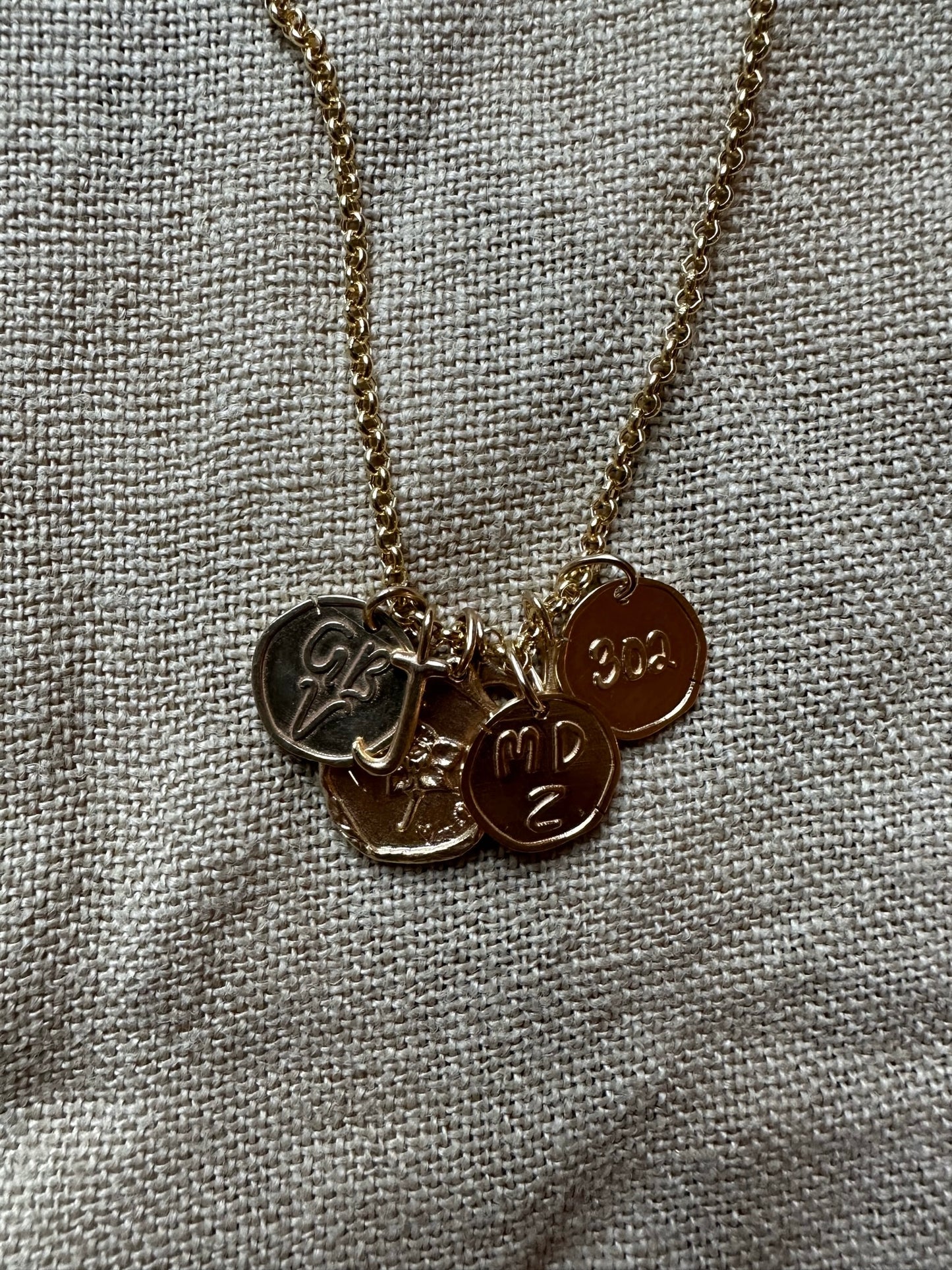 Kaja Erika Jorgensen Coin charm in 18k yellow gold with personalized engraving