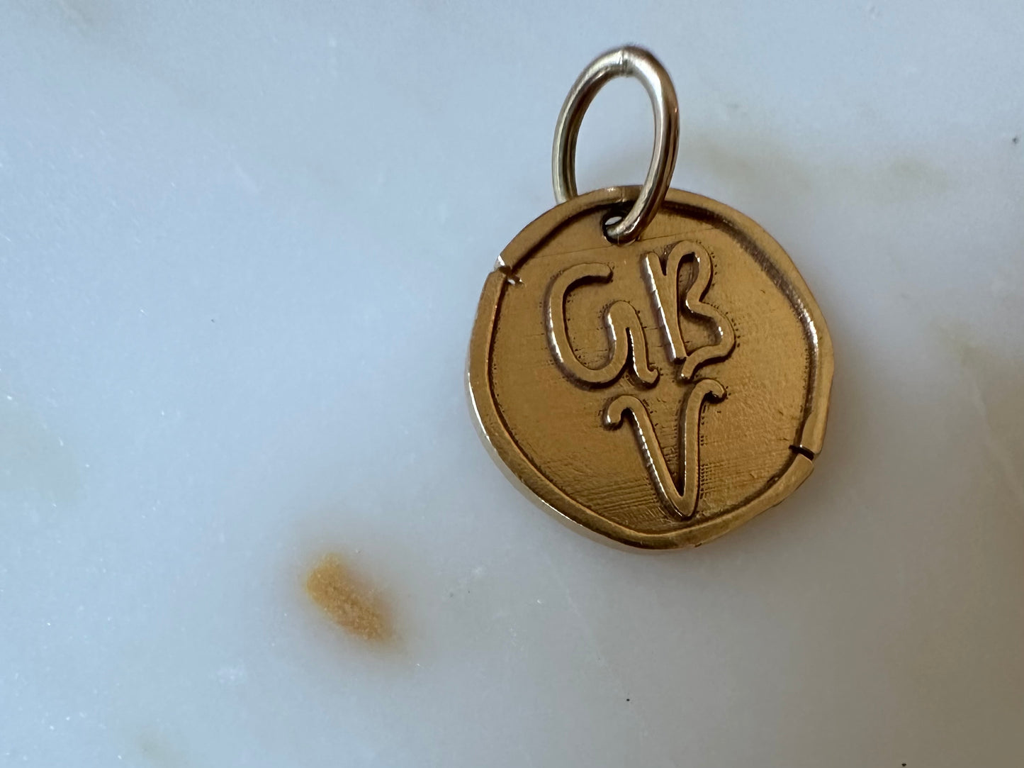 18k yellow gold Coin charm by Kaja Erika Jorgensen