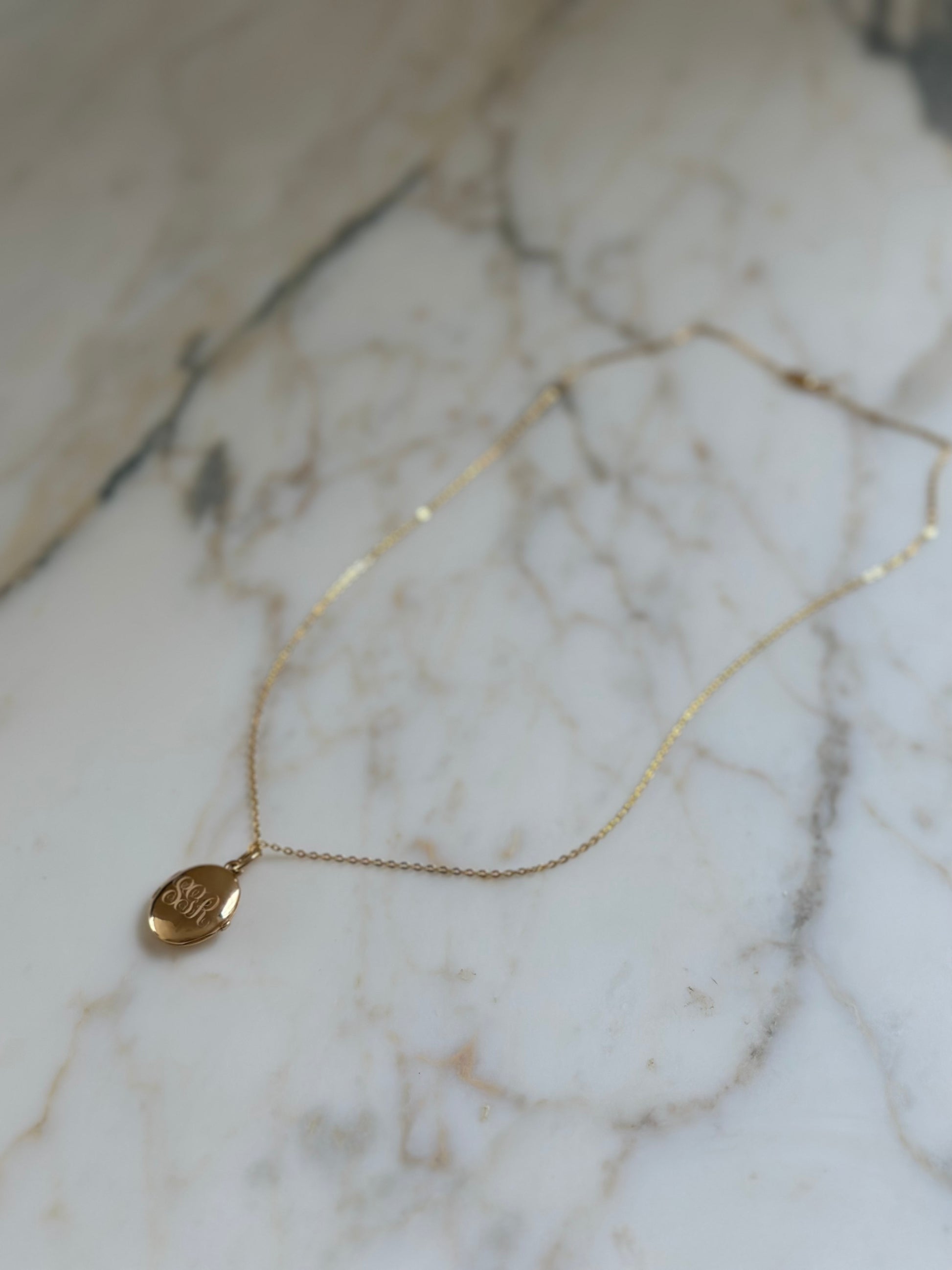 Kaja Erika Jorgensen 18k gold Aria locket